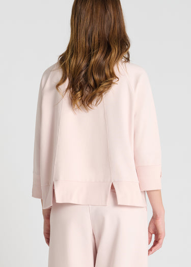Vue arrière sweat Balisier rose découpes dos fentes bas molleton graphique