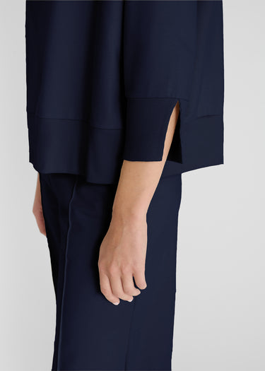 Pull sans manches bleu nuit femme, volume boîte moderne, nervure horizontale au dos - Vue de profil Tournesol