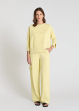 Sweat femme jaune en molleton, col rond, manches raglan longues, volume boîte - Vue de face Balisier