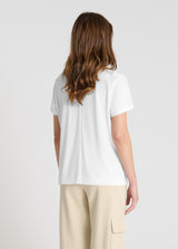 Chemisier blanc femme chic col V, jersey coton doux, coupe droite fendue sur les côtés, style élégant quotidien