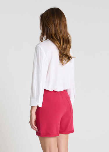 Vue arrière short femme molleton rose poudré, poche plaquée dos, coupe confortable - Hermes
