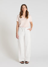 Pantalon molleton femme blanc Jivoe – coupe large droite, ceinture élastiquée, poche latérale
