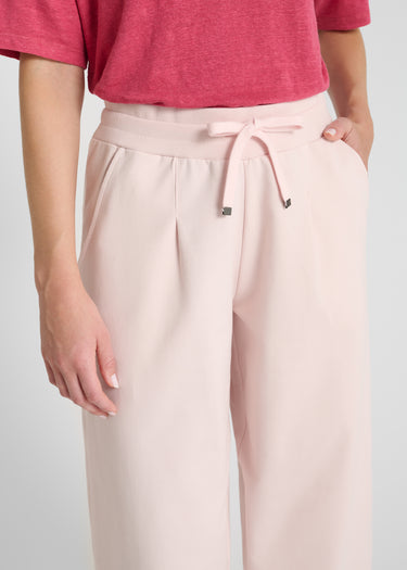 Vue arrière jogging Palamède rose poche passepoilée dos molleton coupe structurée fluide