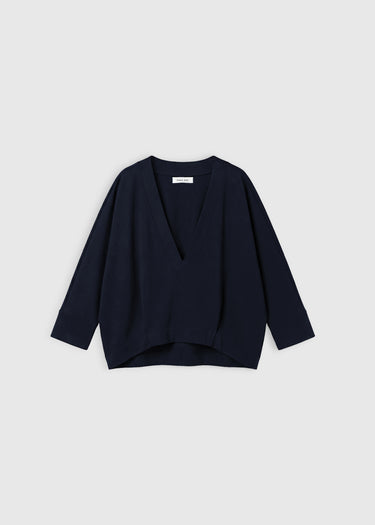Blouse femme bleu marine Andre – volume arrondi structuré par des plis, style chic
