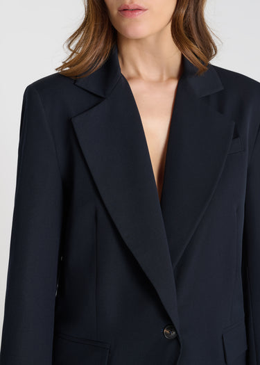 Veste tailleur femme bleu nuit col fermé poche poitrine classe
