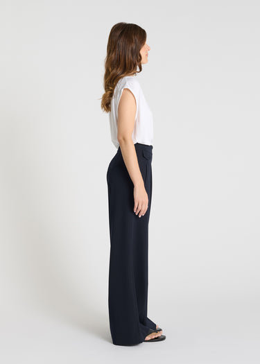 Vue arrière pantalon Aruni bleu marine taille haute large coupe structurée élégante
