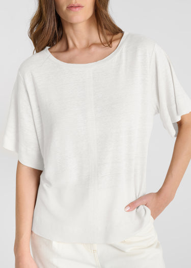 Chemise blanche femme lin jersey manches courtes fluides base fendue détail
