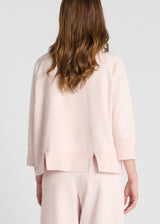 Vue arrière sweat Balisier rose découpes dos fentes bas molleton graphique
