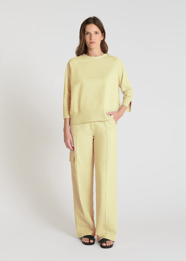 Sweat femme jaune en molleton, col rond, manches raglan longues, volume boîte - Vue de face Balisier
