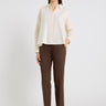 Image 1 : Chemise blanche femme en coton popeline, coupe courte évasée, manches longues chauve-souris, boutons nacre – Dezba ivoire
