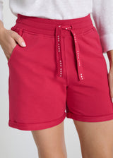 Short femme rose poudré en molleton, coupe droite avec revers, style élégant - Hermes
