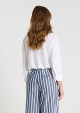 Vue arrière pantalon Hibiscus bleu indigo passepoils dos ceinture élastiquée coton lin
