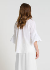 Chemisier Jonquille blanc en voile brodé, blouse femme chic avec broderies ton sur ton et coupe droite, vue de profil
