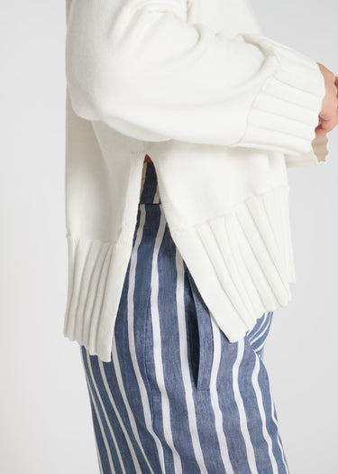 Vue arrière pull Nalini blanc ivoire coutures dos fentes latérales maille coton
