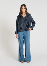 Blouson Noiron bleu marine femme capuche zip central veste molleton technique élégante
