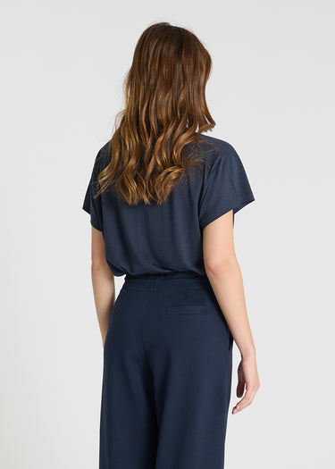 Détail jogging Palamède bleu nuit molleton taille élastiquée liens ajustables poches italiennes
