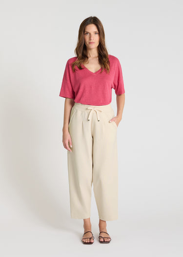 Pantalon molleton femme beige Palamede - Jogging carotte taille élastique, plis devant, coupe structurée confortable
