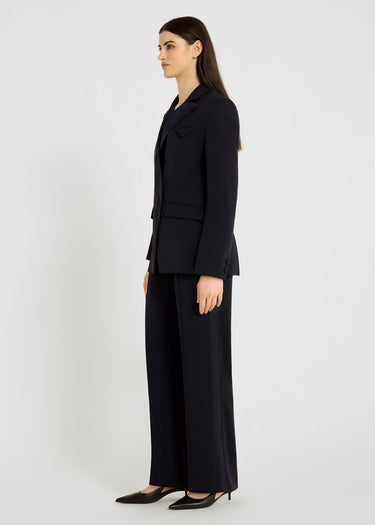 Pantalon Raul S bleu nuit, détail bande satin – fermeture zip, poches passepoilées dos
