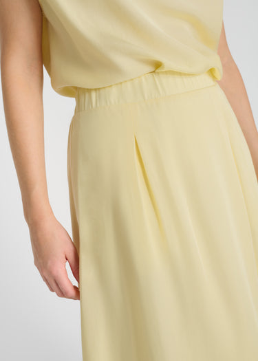 Détail jupe Tulipe jaune Tencel zip latéral discret doublure confort opacité
