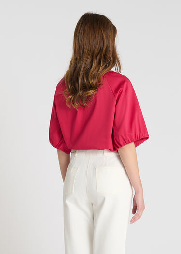 Vue arrière jean coupe carotte blanc, poches plaquées, étiquette logo - Vikram
