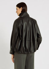 Blouson femme noir zippé – col montant à liens, poignets nacre, veste molleton chic
