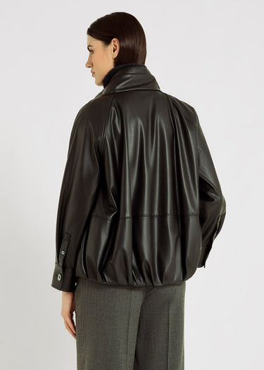 Blouson femme noir zippé – col montant à liens, poignets nacre, veste molleton chic
